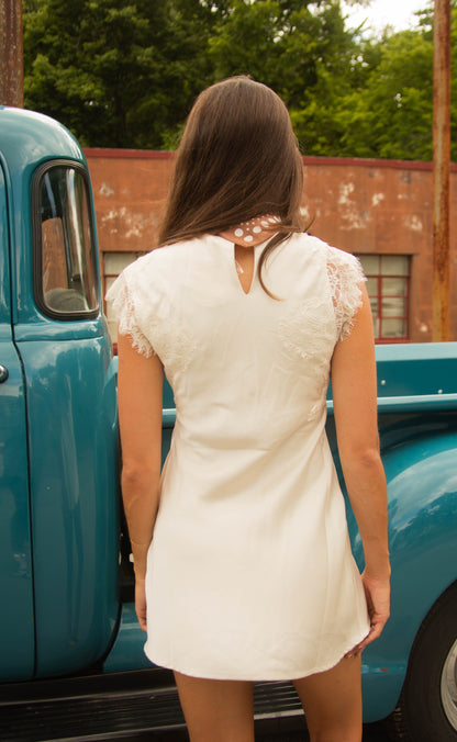 make an impression lace mini dress