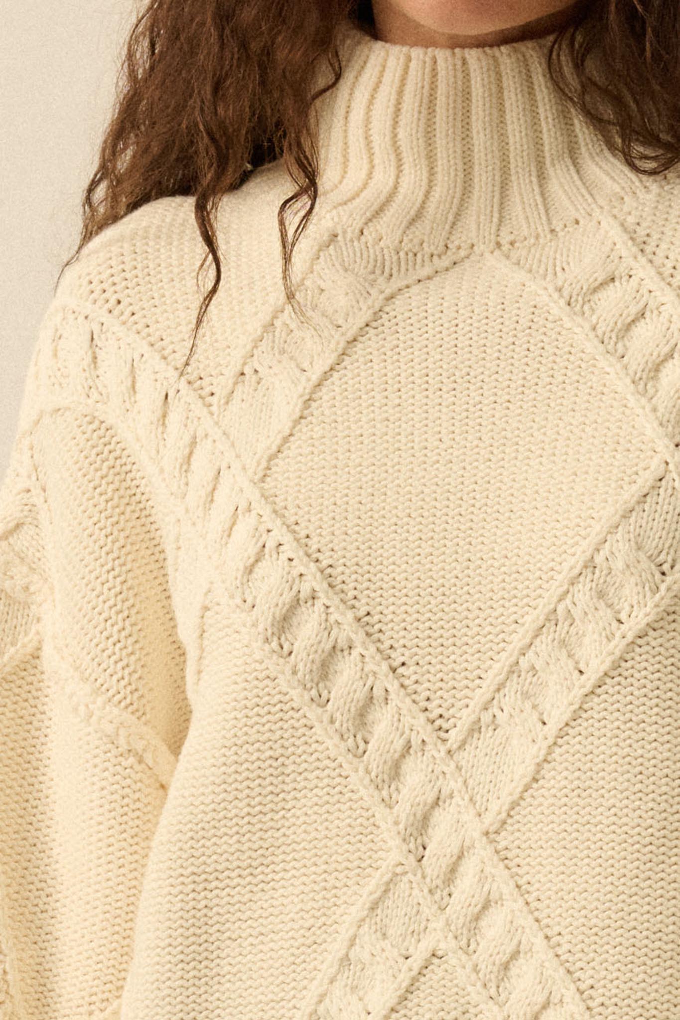 Twist Ending Oversize Cable Knit Mock-Neck Sweater